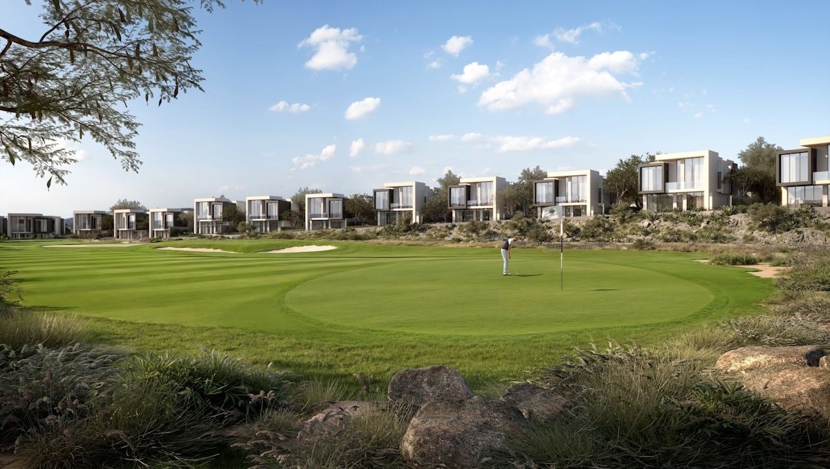 Golf green with villas beyond the fairway